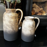 Two tone ombre Oti Terracotta Pitcher Jug Vase in a sandy-beige tones into a dark charcoal base&nbsp;
Available in 2 sizes - Small 26cm &amp; Large 32.5cm