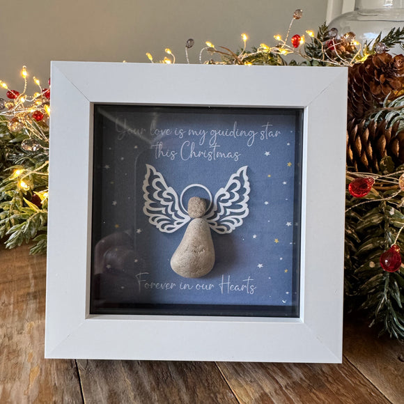 Pebble Art by La De Da Living 

Award winning keepsake gifts - Handmade in the Cotswolds 



Christmas Mini Framed Pebble Art - White block square frame 12.5cm
'Your love is my guiding star this Christmas.. Forever in our hearts'
