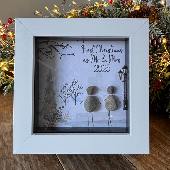 Pebble Art by La De Da Living 

Award winning keepsake gifts - Handmade in the Cotswolds 



Christmas Mini Framed Pebble Art - White block square frame 12.5cm
'First Christmas as Mr & Mrs 2025'