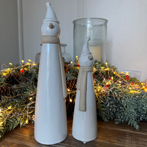 Christmas Ceramic Neutral Glazed with texture detailed tall Snowmen with a stone scarf & carrot nose..
Available in 2 sizes - Small H20cm & Large H26cm 