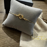 Gold plated love knot bolo bracelet