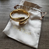 Gold Plated teardrop open cuff hinged bangle bracelet by Accessories by Park Lane 
