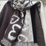 Accessories by Park Lane
Super soft heavyweight woven Scarf with reversible design which features pattern of large sketched lighter hearts &amp; a fringed hem&nbsp;
Colour - Chocolate