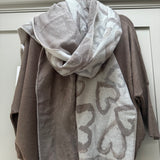 Accessories by Park Lane
Super soft heavyweight woven Scarf with reversible design which features pattern of large sketched lighter hearts &amp; a fringed hem&nbsp;
Colour - Natural&nbsp;