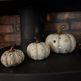 Off White distressed Pumpkin with a brown stalk and lots of holes for the LED light to come through&nbsp;

Available in 3 sizes: Small (11cm), Medium (10.4cm) &amp; Large (16.5cm)