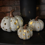 Off White distressed Pumpkin with a brown stalk and lots of holes for the LED light to come through&nbsp;

Available in 3 sizes: Small (11cm), Medium (10.4cm) &amp; Large (16.5cm)