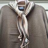 Accessories by Park Lane
Mini knit scarf; small triangle-shaped scarf wraps closely around the neck&nbsp;
Colour - Linen &amp; edged with Dark brown lines