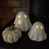 White Ceramic Glazed Ghost LED Decoration with light coming through the eye holes

Available in 2 sizes: Small 9cm &amp; Large 10cm