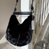 Accessories by Park Lane&nbsp;
BAG94 High quality luxury Faux Fur Bag 36x29cm with detailed knotted straps&nbsp;
Colour - Ebony Black