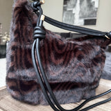 Accessories by Park Lane&nbsp;
BAG94 High quality luxury Faux Fur Bag 36x29cm with detailed knotted straps&nbsp;
Colour - Dark Zebra