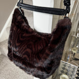 Accessories by Park Lane&nbsp;
BAG94 High quality luxury Faux Fur Bag 36x29cm with detailed knotted straps&nbsp;
Colour - Dark Zebra