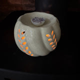 Beige round ceramic Pumpkin wax melt burner with cut out leaf details 9x14cm&nbsp;