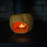 Orange Ceramic Wax Burner with cut out leaf design