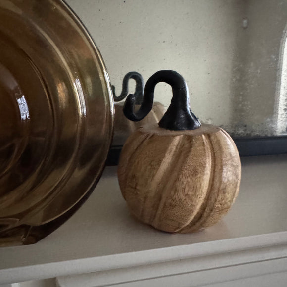 Wooden pumpkin with twisted metal top