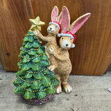 Christmas&nbsp;Ruth Rabbit Figure adoring the tree with a star on top with the help of little Bonnie Rabbit 14cm&nbsp;