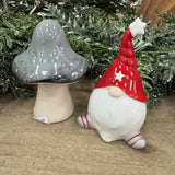 Small Ceramic glazed Gonk wearing a twisted tall&nbsp; Red hat 10cm