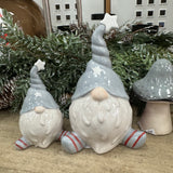 Ceramic glazed Gonk wearing a Grey twisted Hat
Available in 2 sizes: Small 10cm &amp; Large 15.5cm