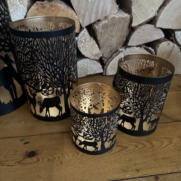 Black & Gold metal Candle Holder with Cut out Reindeer & Trees Scene
Available in 3 sizes: Small 10cm, Medium 14cm & Large 