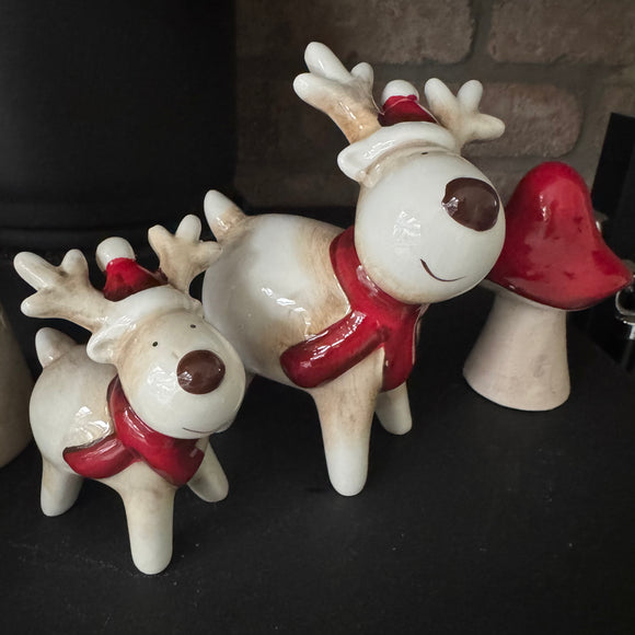 Glazed Ceramic Neutral tones Reindeer wearing a Red Scarf & Hat Available in 2 sizes - Small 10.5cm & Large 14cm 