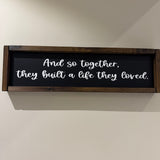 Made in the UK by Giggle Gift co.
Rectangular L64cm Framed Plaque with Black vinyl;
Quote in white text - And so together, they built a life they loved