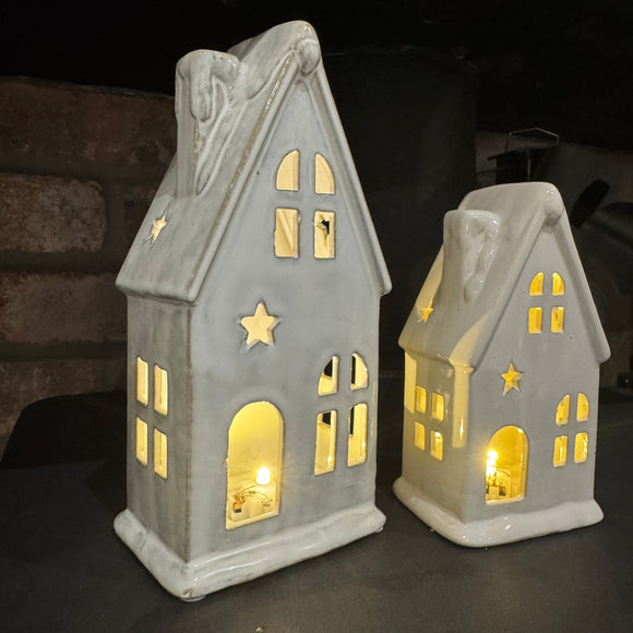 Ceramic LED House with Snowy Roof 
LR44 Battery operated that can be replaced
Available in 2 sizes: Small 10cm & Large 20cm