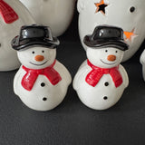 Christmas Ceramic Classic White Snowman collection
Wearing a Red scarf, black hat and smiling face body&nbsp;
Fun Salt &amp; Pepper Pots 7.5cm
