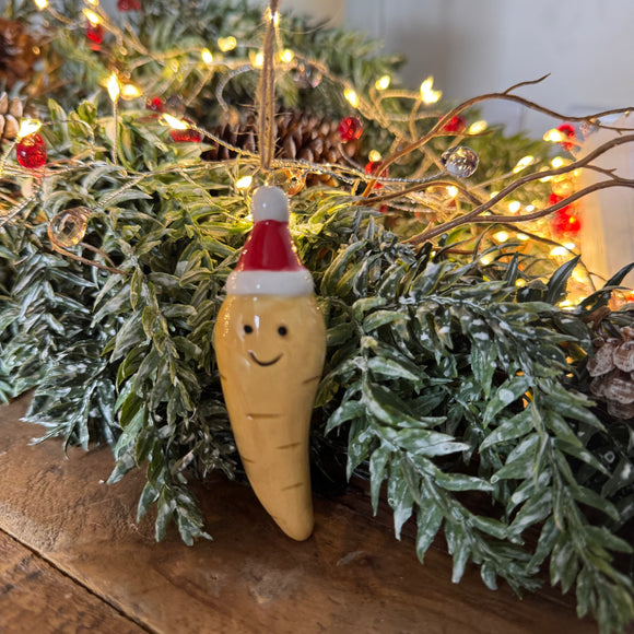 Fun Christmas ceramic Hanging Decoration
Parsnip 8.5cm wearing a santa hat with smiling face 