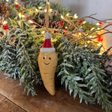 Fun Christmas ceramic Hanging Decoration
Parsnip 8.5cm wearing a santa hat with smiling face&nbsp;