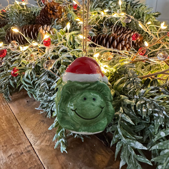 Fun Christmas ceramic Hanging Decoration
Green Cabbage wearing santa hat with smiling face 5.8cm 