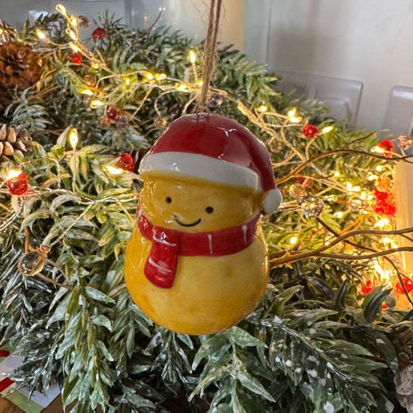 Fun Christmas ceramic Hanging Decoration
Potato with a big smile wearing a santa hat & scarf 7cm 