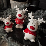 Ceramic White standing Reindeer wearing a Red jumper