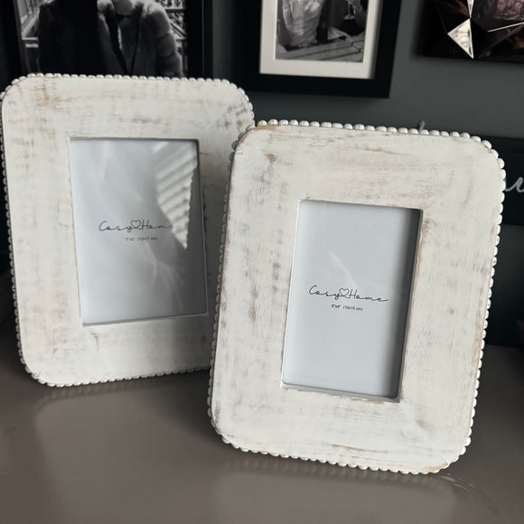 Whitewashed Wooden beaded design Photo Frames

Available in 2 photo sizes - Large 7x5