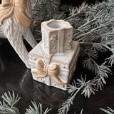 Christmas dinner tapered candleholder
Ceramic glazed small Off-white Neutral stack of Gift boxes with a neutral rough big bow 9cm&nbsp;