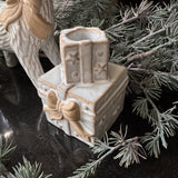 Christmas dinner tapered candleholder
Ceramic glazed small Off-white Neutral stack of Gift boxes with a neutral rough big bow 9cm&nbsp;