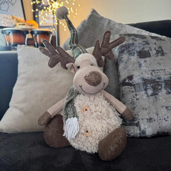 Sitting Fur Reindeer with Green Hat & Scarf 32cm with a big smile