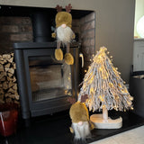Woodland Sitting Gonk with rich brown body, ochre hue coloured fur hat with Antlers, fluffy beard &amp; button nose.&nbsp;
Available in 2 styles: Sitting &amp; With dangly Legs
