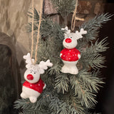 Christmas ceramic hanging decoration; White Reindeer wearing a Red spotty jumper and with a Red nose
Available in two positions - Sitting H6cm &amp; Standing H8cm