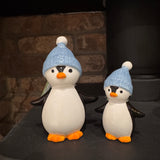 Christmas Fun ceramic glazed Penguins wearing a blue knitted bobble hat&nbsp;
Available in two sizes - Small 9.5cm &amp; Large 13cm