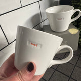 Keith Brymer Jones - Word Range Medium Bucket White Porcelain Mug 350ml with handstamped quote
Colour font - Vibrant Orange
Quote - #WTF