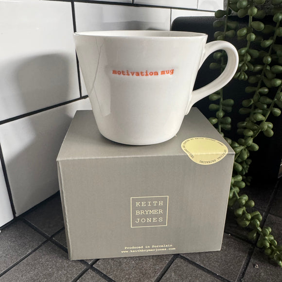Keith Brymer Jones Word Range Medium Bucket White Porcelain Mug 350ml with handstamped quote
Colour font - Vibrant Orange
Quote - Motivation Mug