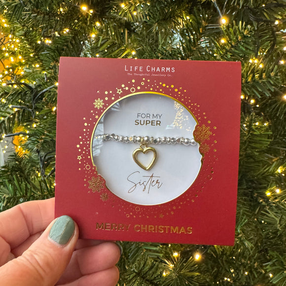 Just Because Silver plated Christmas Bracelet Collection;
Charm - gold open heart
Quote - For my super sister