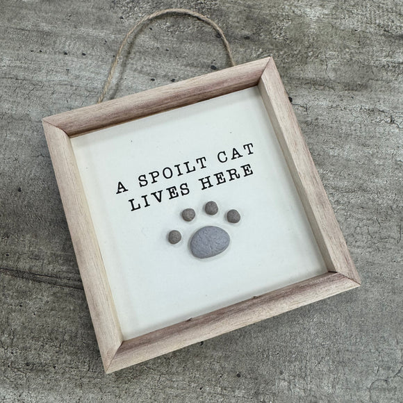 Hanging Wooden Pebble Sign - 'A spoilt cat lives here'