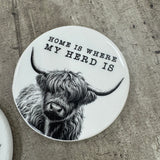 White glazed Ceramic Coaster with a black classy pencil illustration of a Highland Cow 10cm

Quote - Home is where the herd is