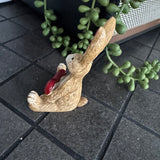 Sitting Ruth Rabbit Holding a Red Heart