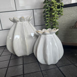 White Glazed Ribbed Poppy Seed Vases&nbsp;
Available in two sizes - Small H11cm &amp; Large H16cm&nbsp;