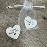 Small gifts with a meaningful quote for someone special
Small White porcelain heart 3cm
Black text Quote - 'You're Beautiful' with a small heart
