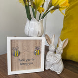 Small Hanging Wooden 13cm square Sign
Quote as follows; 'Thank you for beeing you'
Illustration of two Pebble Bees making a heart shape&nbsp;