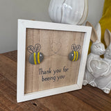 Small Hanging Wooden 13cm square Sign
Quote as follows; 'Thank you for beeing you'
Illustration of two Pebble Bees making a heart shape&nbsp;