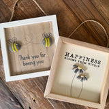 Hanging Wooden Pebble Happiness Sign - 'Blooms from within..'