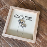 Small Hanging Wooden 13cm square Sign
Quote as follows; 'Happiness blooms from within'
Illustration of two Pebble Flowers